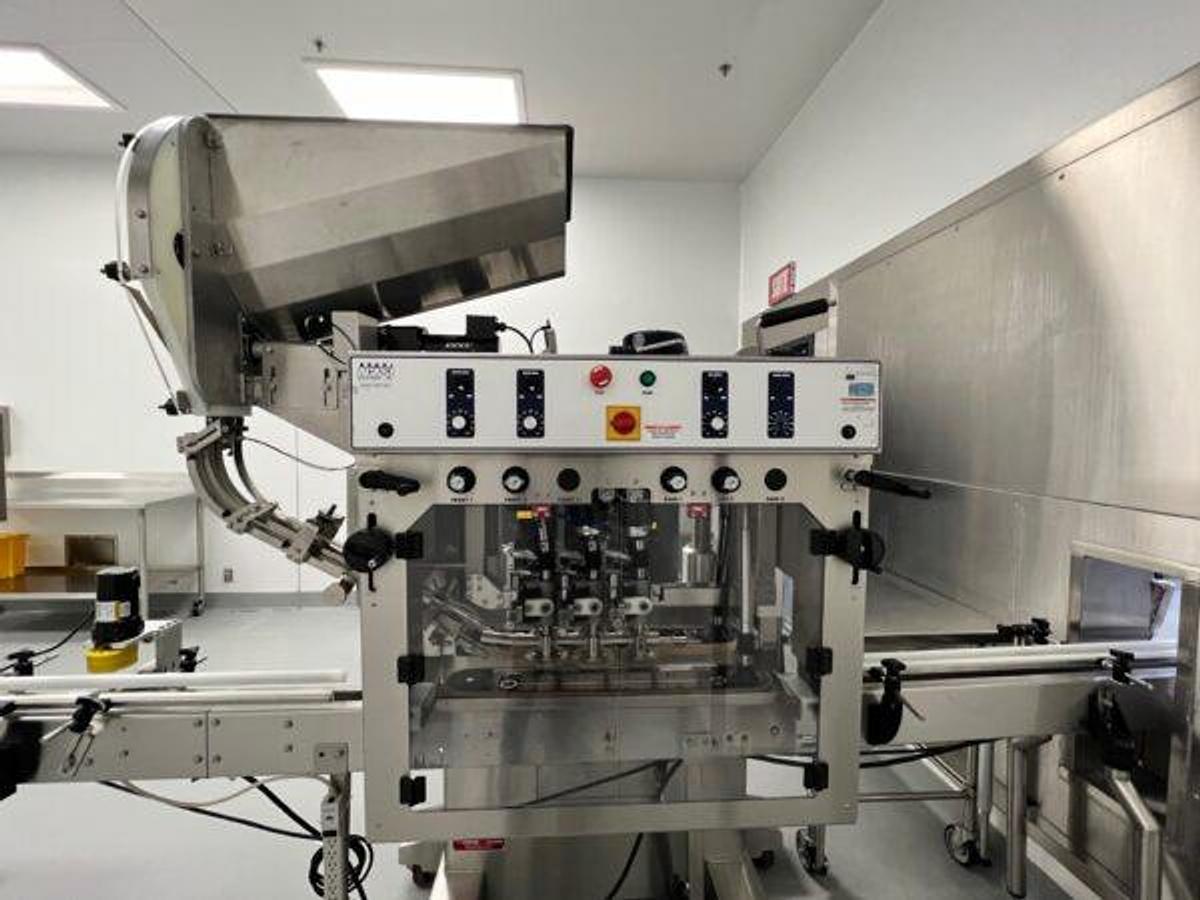 Used Acasi  6  spindle  capper