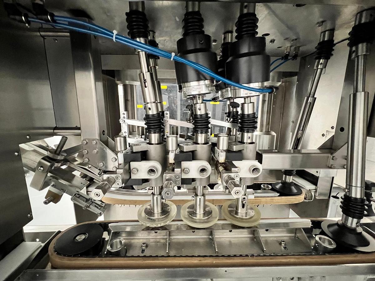 Used Acasi  6  spindle  capper