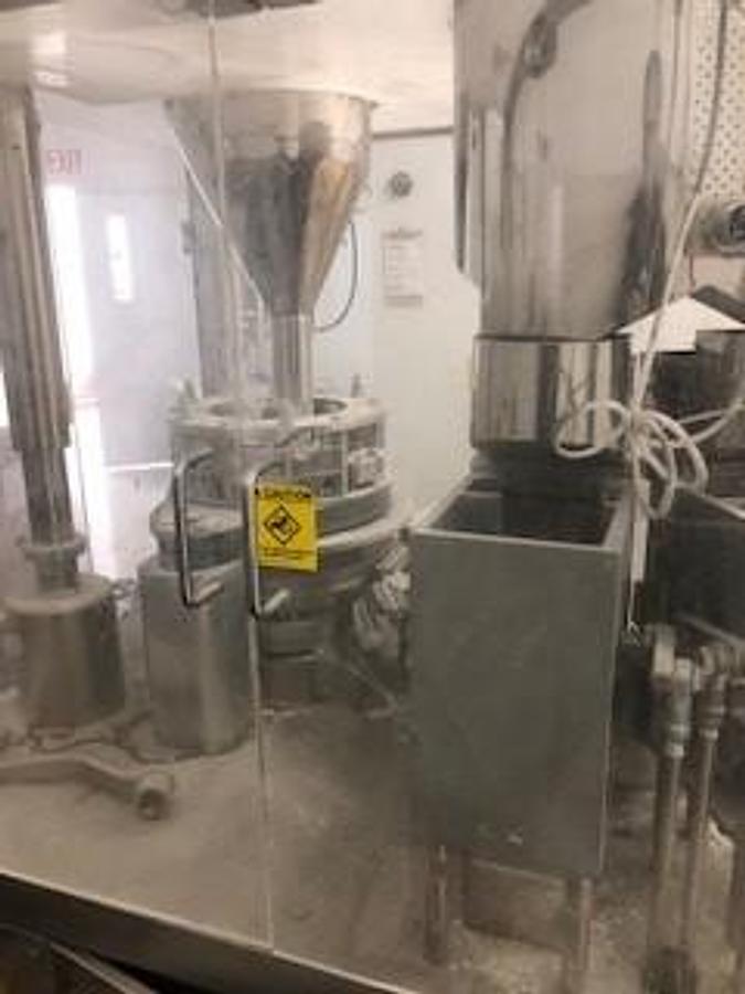Used Tradamax 2000 capsule filling machine 00