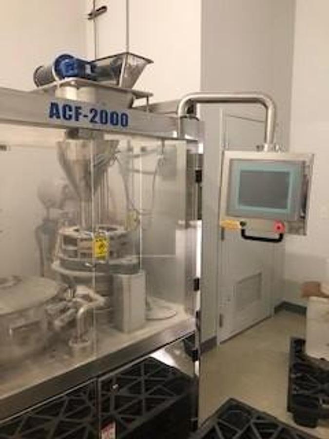 Used Tradamax 2000 capsule filling machine 00
