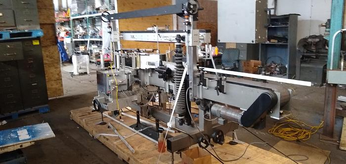 Usado Universal SL-1000 Contract Packager Front Back and wrap labeler