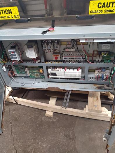 Used TRine 4500 roll fed labeler - hot melt