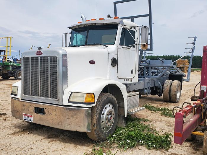 Used 1990 Peterbilt w/ New Holland 1051 Stack Retriever