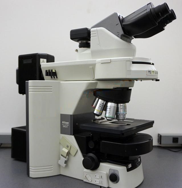 Used Nikon Eclipse 90i microscope configured for brightfield, DIC, fluorescence