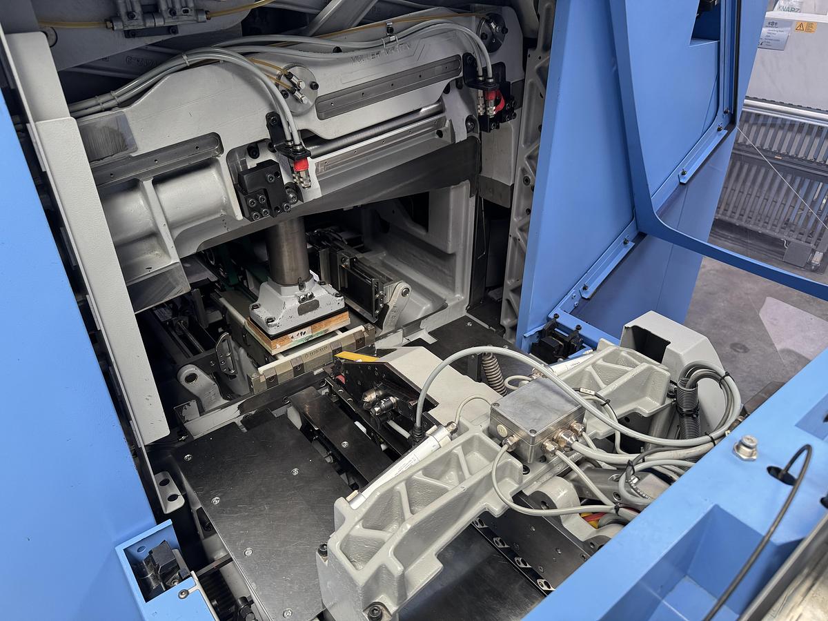 Used Müller Martini three knife trimmer Orbit (3675) (2009)