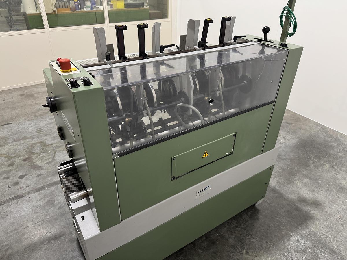 Used Müller Martini signature feeder 1551 (1996)