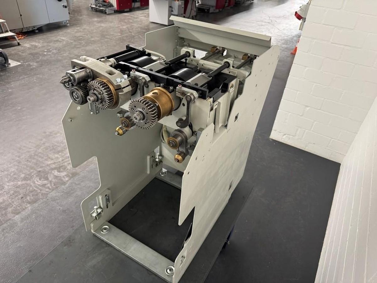 Used Kolbus PUR spine gluing unit (2014)