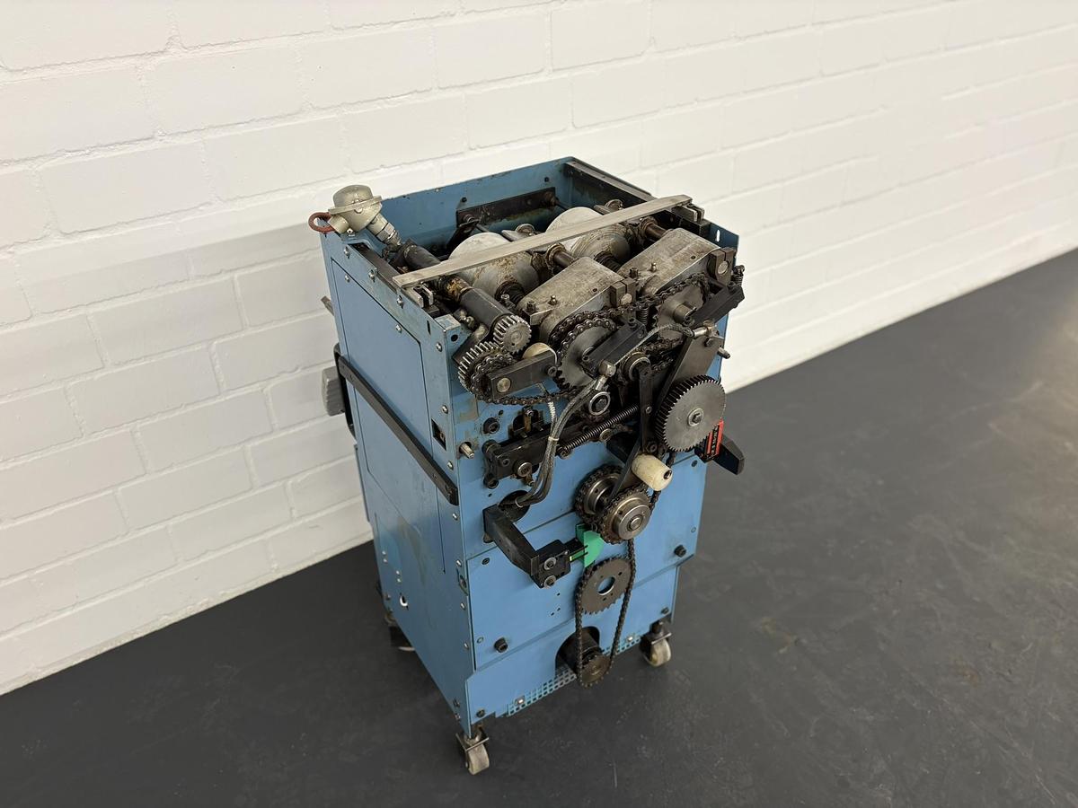 Used Wohlenberg Master 6501 EVA-hotmelt spine gluing unit (1995)