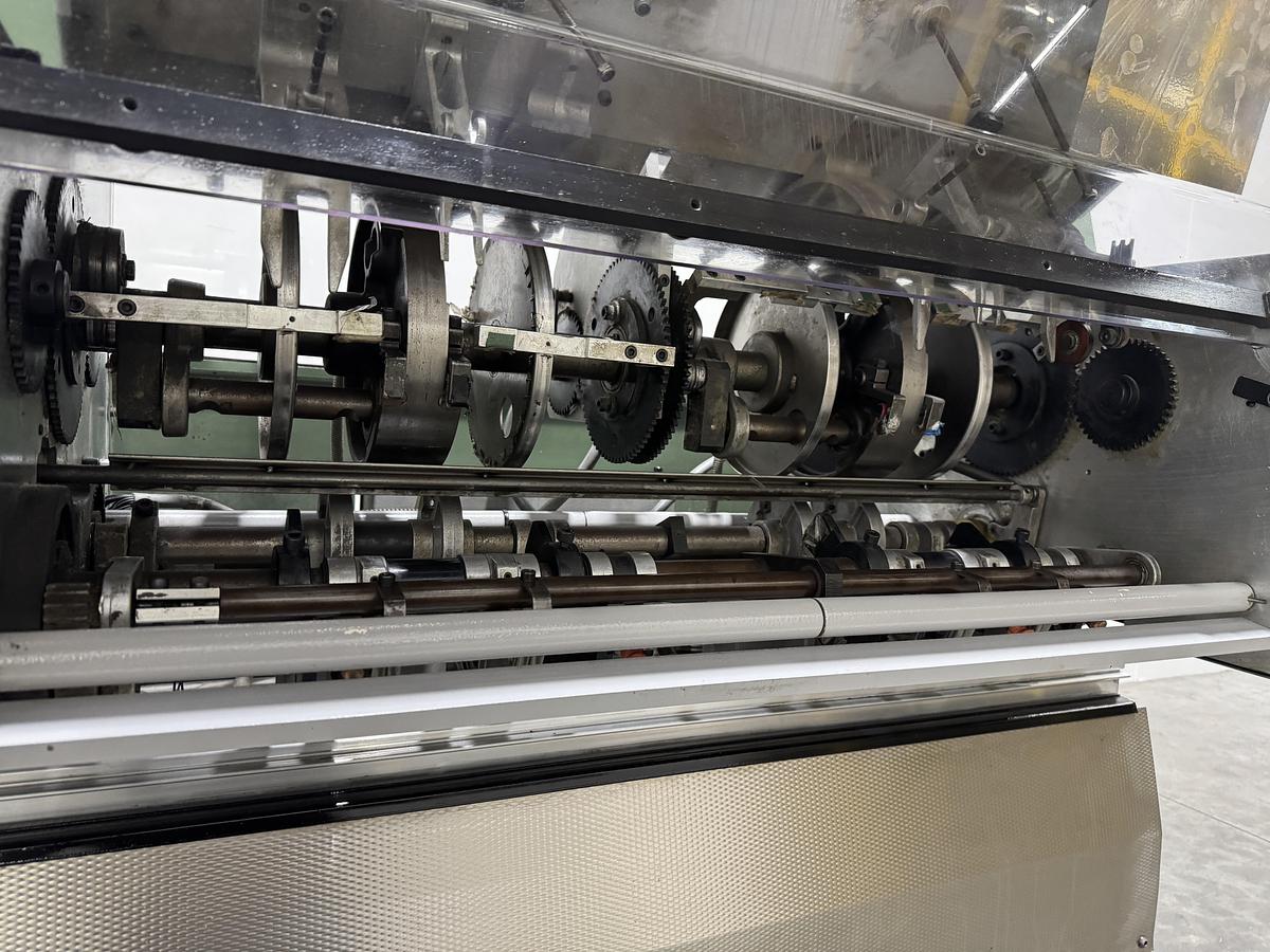 Used Müller Martini signature feeder 1551 (1996)