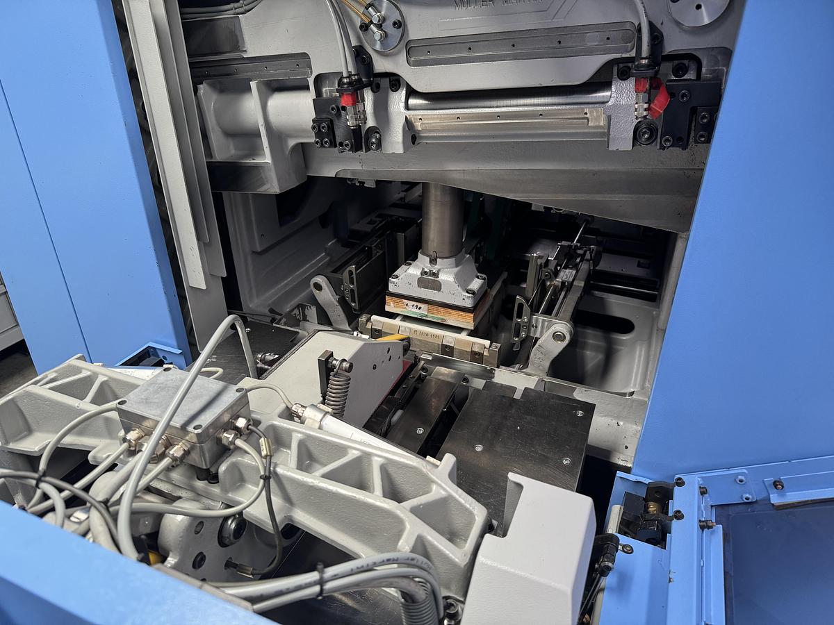 Used Müller Martini three knife trimmer Orbit (3675) (2009)