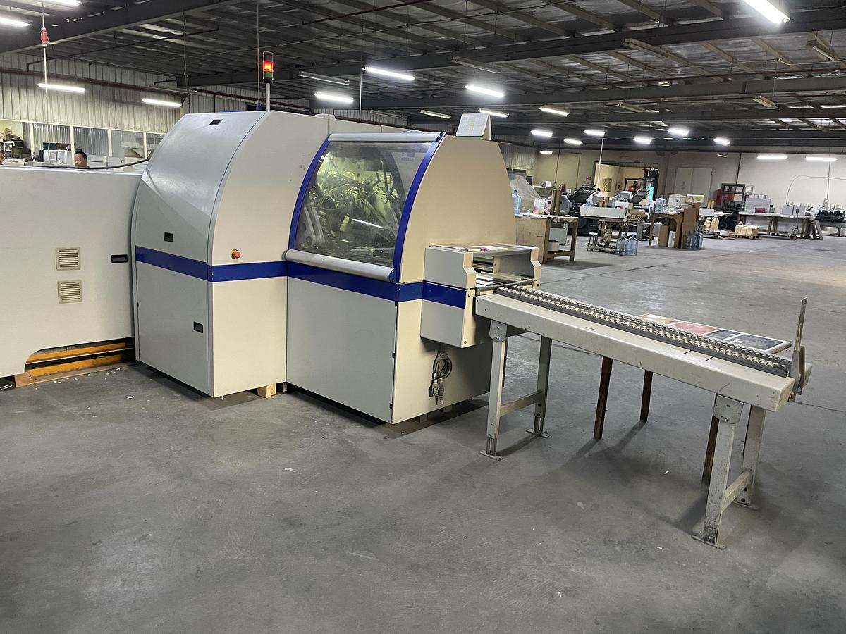 Used Kolbus three knife trimmer HD 143.P (2011)
