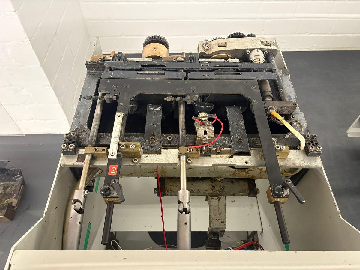 Used Kolbus PUR + EVA Spine gluing unit (2005)