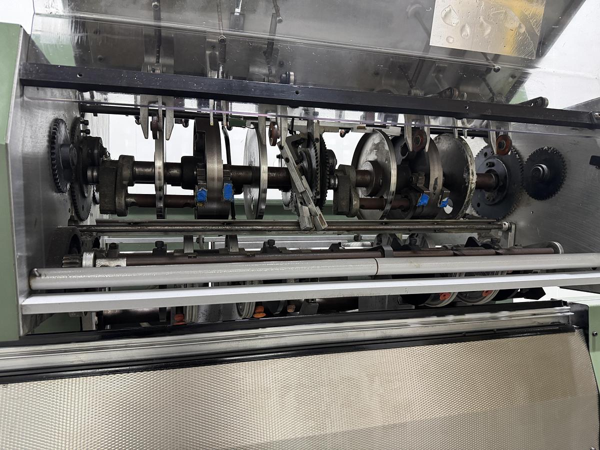 Used Müller Martini signature feeder 1551 (1996)