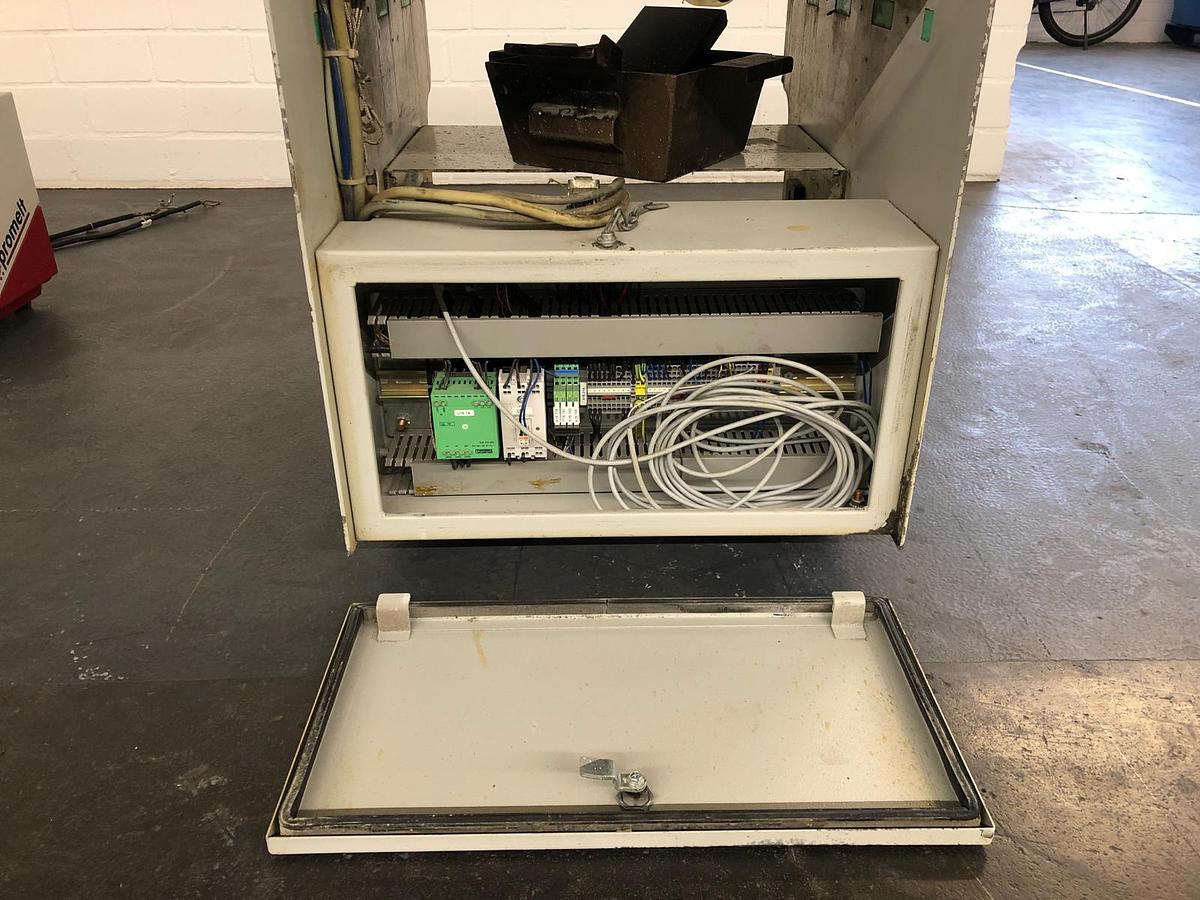 Used Kolbus PUR + EVA spine gluing unit (2005)