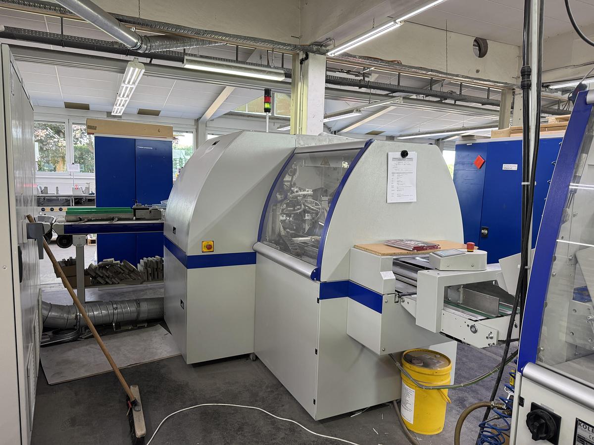 Used Kolbus three knife trimmer HD 143.P (2015)