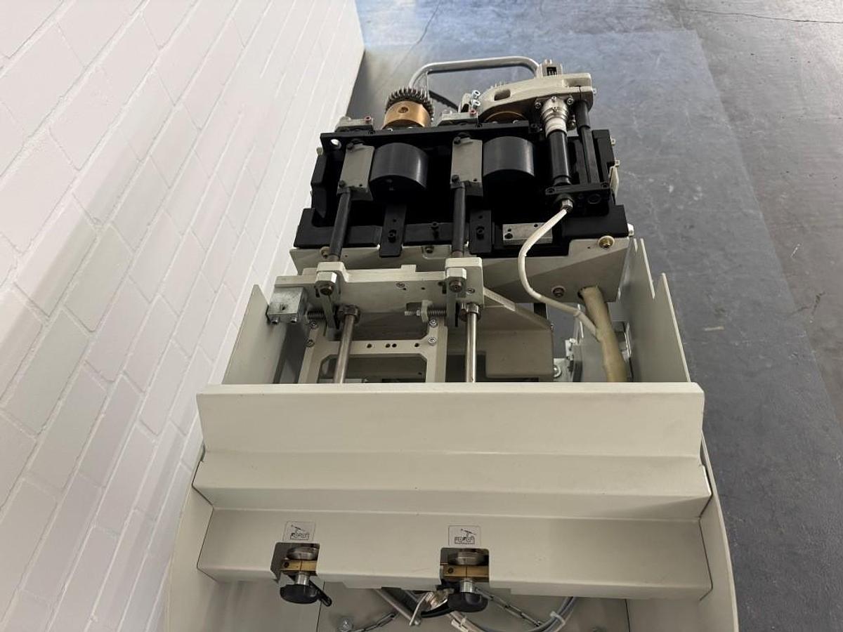 Used Kolbus PUR spine gluing unit (2014)