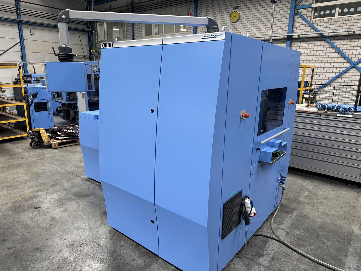 Used Müller Martini three knife trimmer Orbit (3675) (2009)