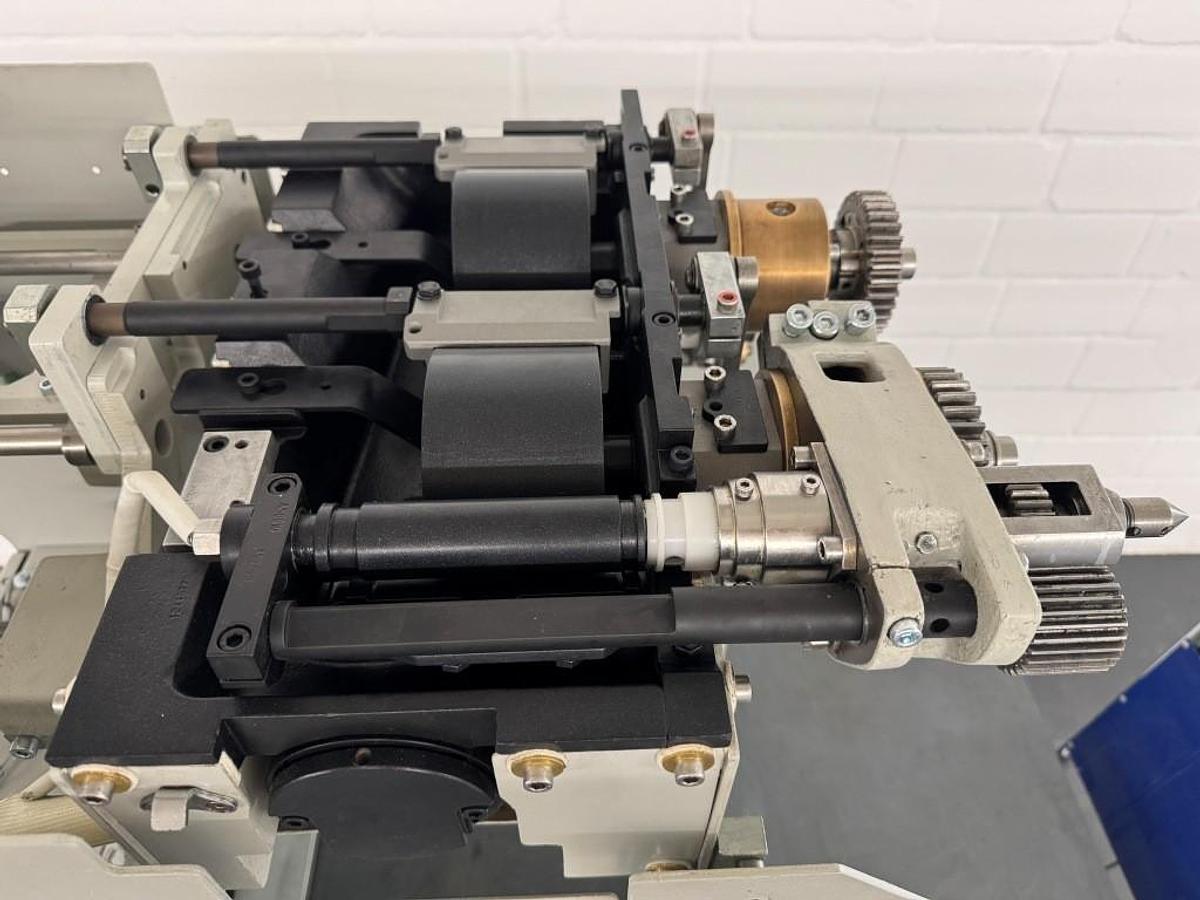 Used Kolbus PUR spine gluing unit (2014)