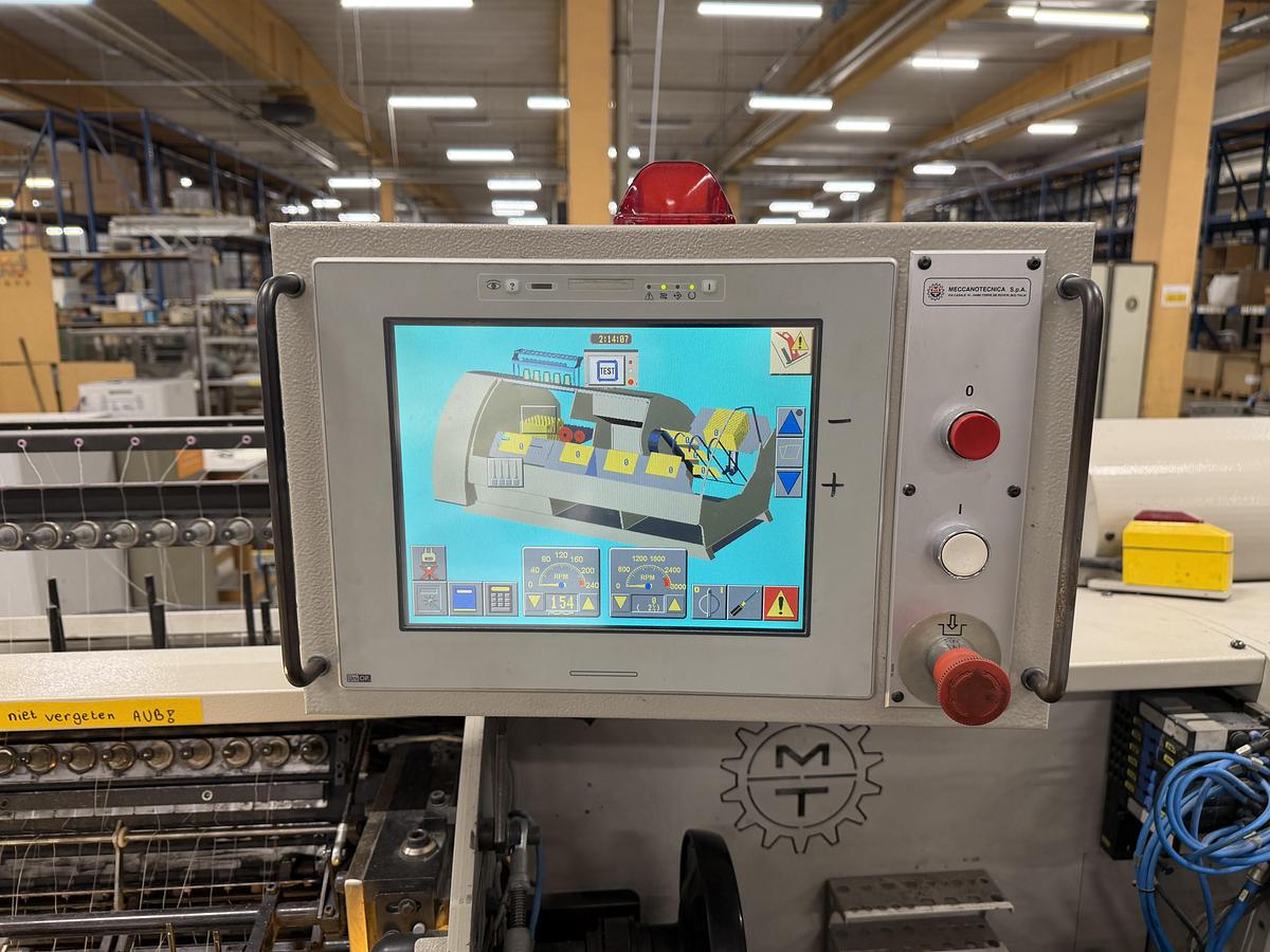 Used Meccanotecnica sewing machine Aster 220 SAO (2005)