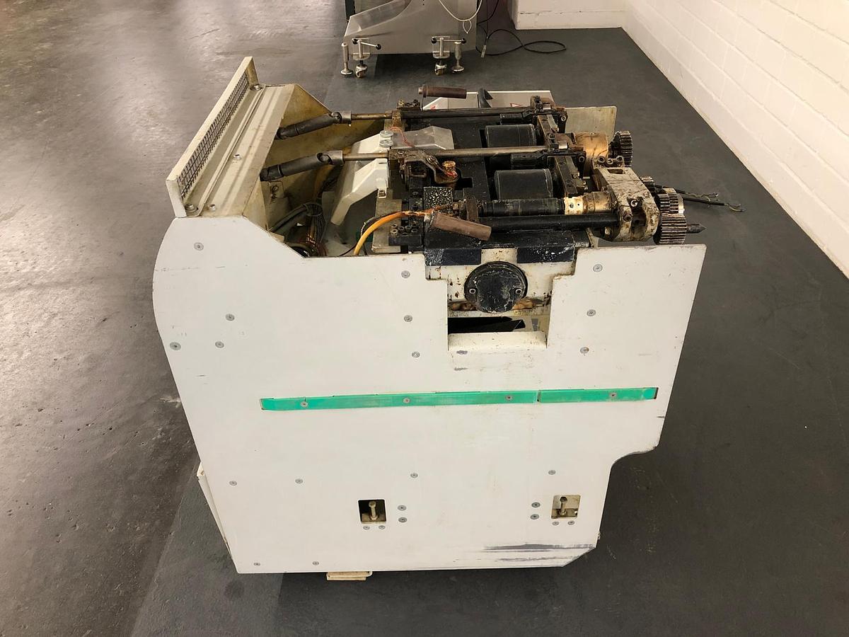 Used Kolbus PUR + EVA spine gluing unit (2005)