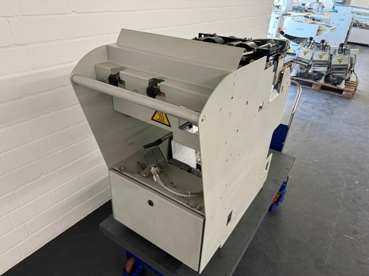 Used Kolbus PUR spine gluing unit (2014)