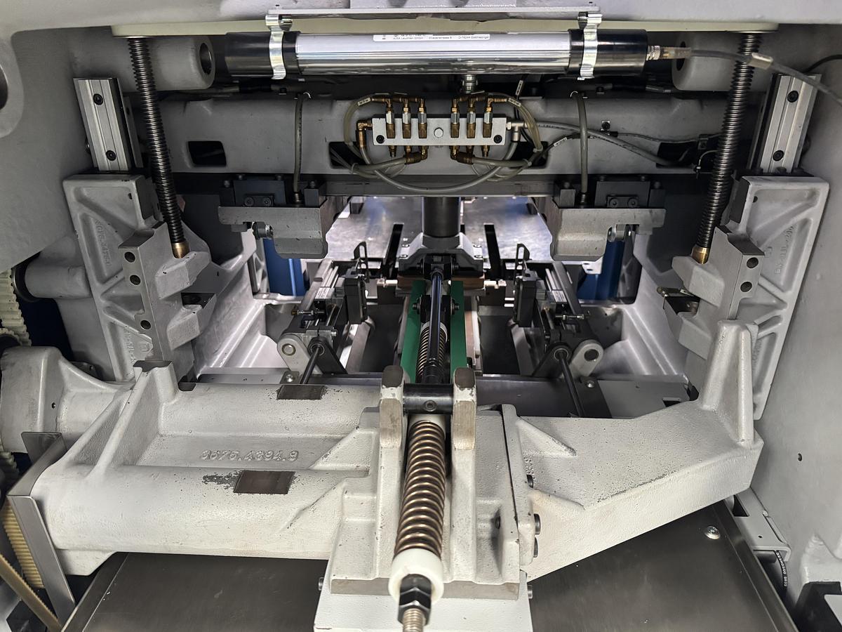 Used Müller Martini three knife trimmer Orbit (3675) (2009)