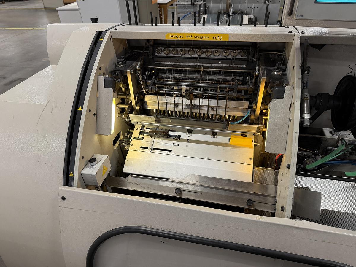 Used Meccanotecnica sewing machine Aster 220 SAO (2005)