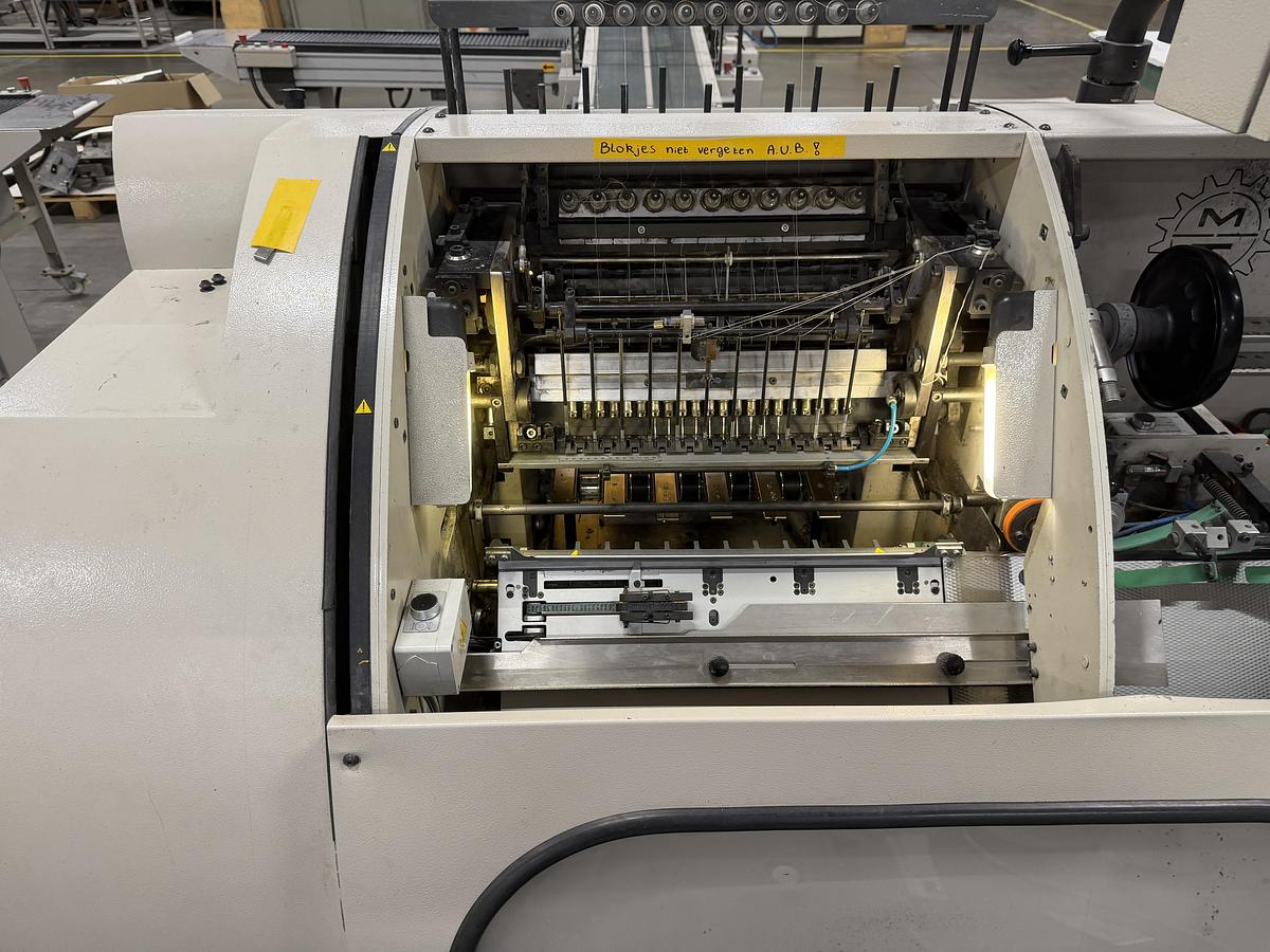 Used Meccanotecnica sewing machine Aster 220 SAO (2005)