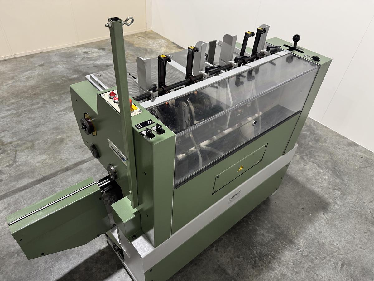 Used Müller Martini signature feeder 1551 (1996)