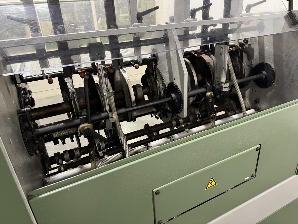 Used Müller Martini signature feeder 1551 (1996)