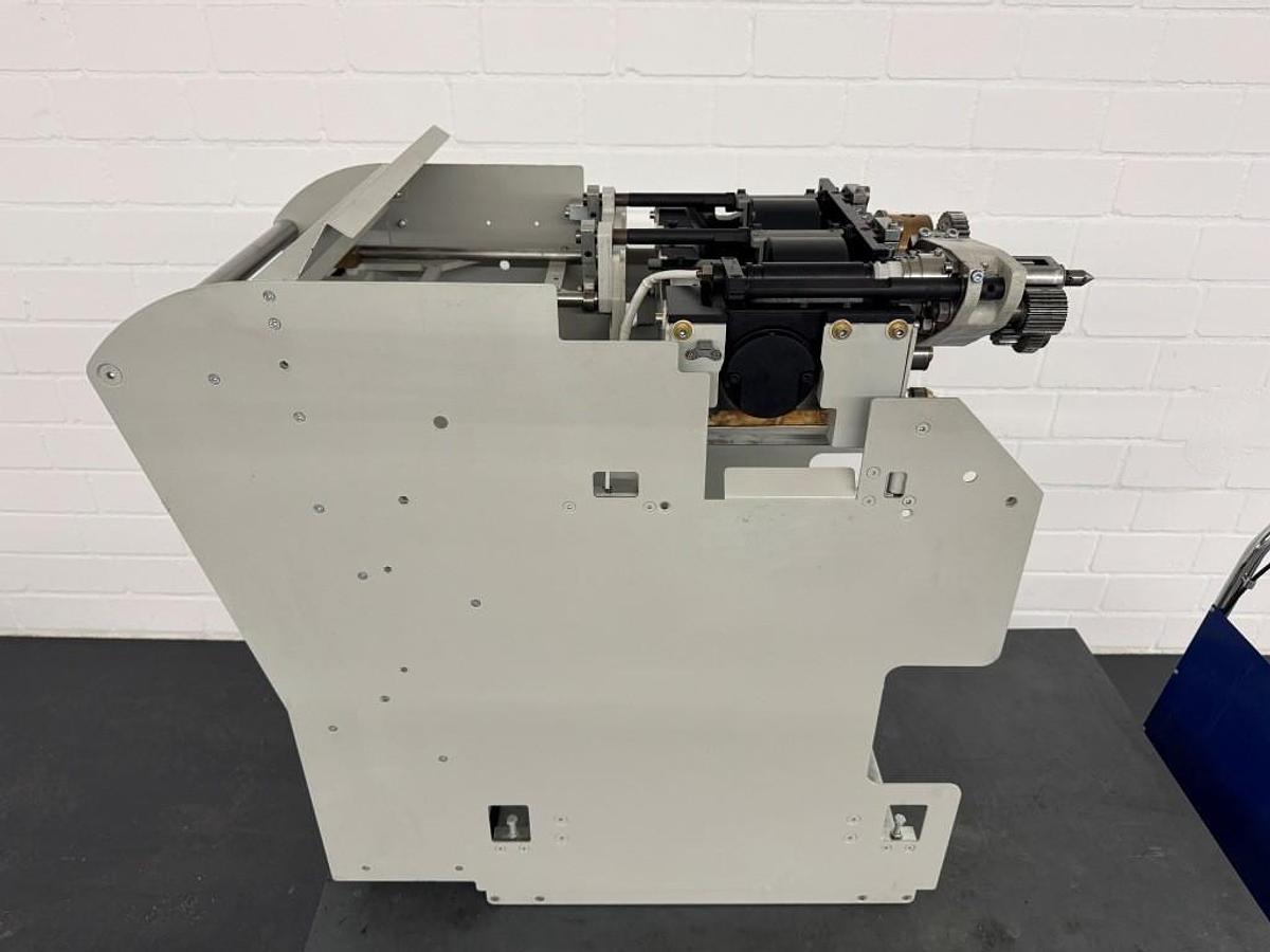 Used Kolbus PUR spine gluing unit (2014)