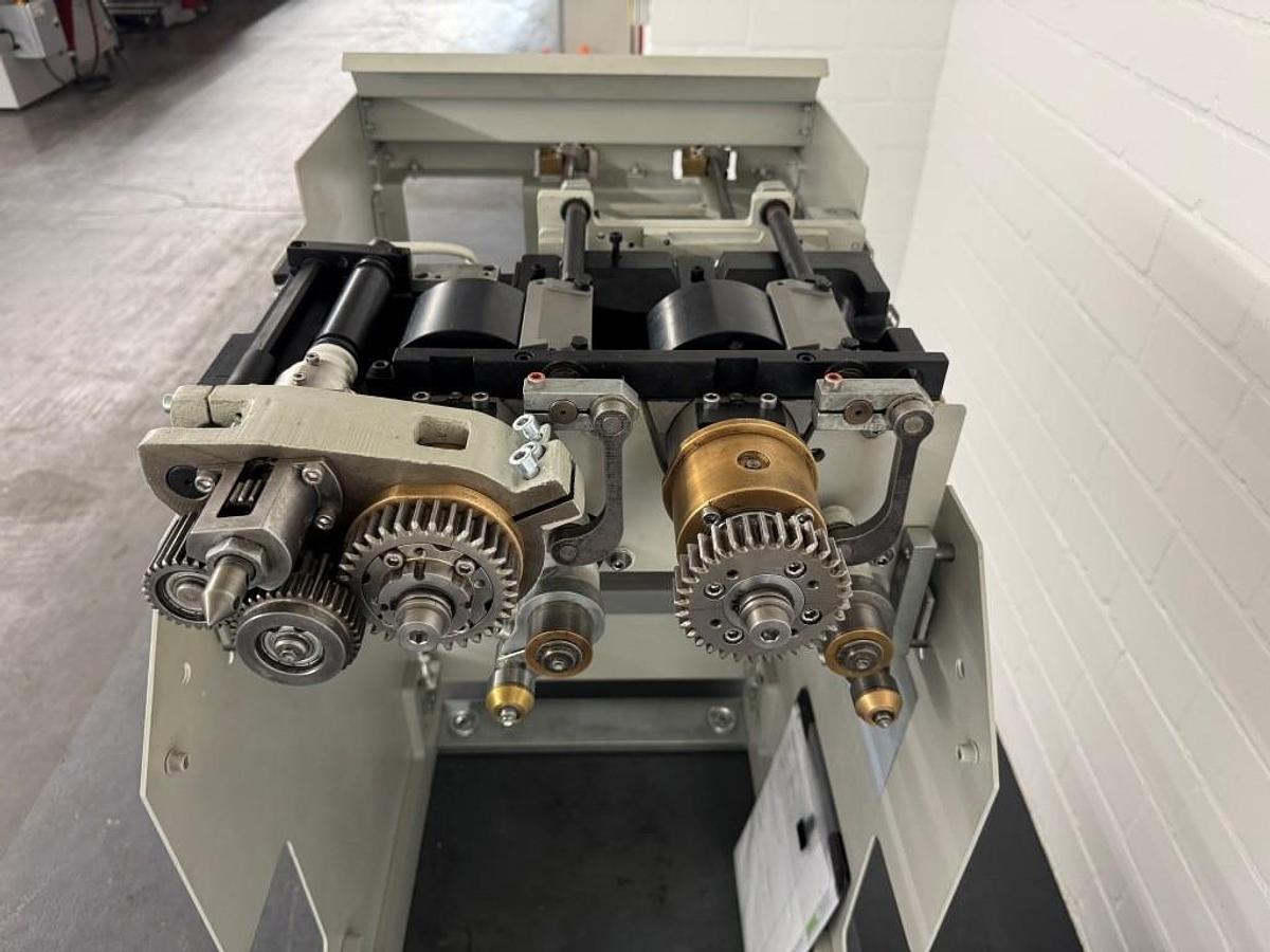 Used Kolbus PUR spine gluing unit (2014)