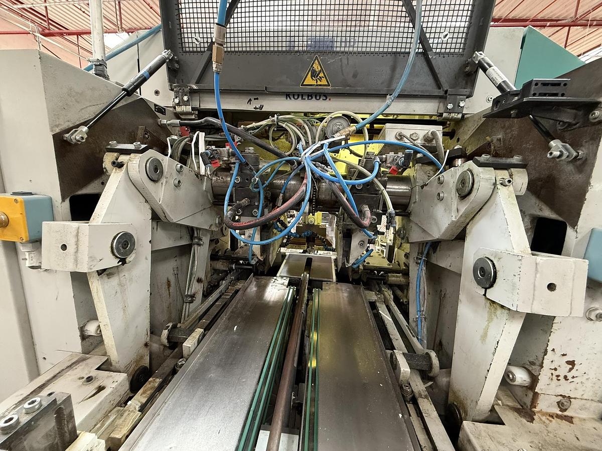 Used Kolbus three knife trimmer HD 142.P (2004)