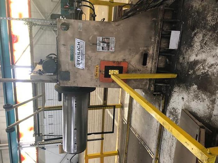 Used 20,000 LB x 48" WIDE STIRLICH MOTORIZED UNCOILER