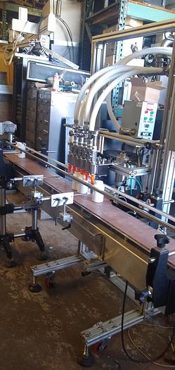 Refurbished Filling Express 6 head pressure gravity filler