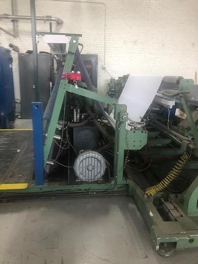 Used 72" WIDE REM CENTER SURFACE DUPLEX SLITTER REWINDER