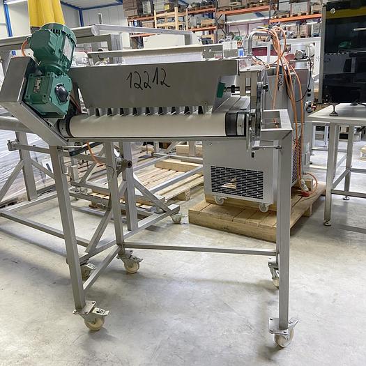 Used used Truffle ball loader with approx. 470 mm working width and 10 product rows.