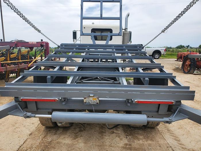 Used 1990 Peterbilt w/ New Holland 1051 Stack Retriever