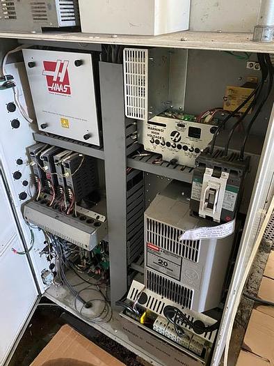 Used 2007 Haas CNC Lathe SL-10T & Servo Bar 300 Feeder