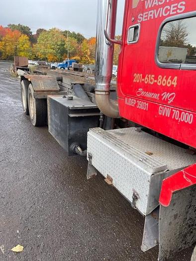 Used 1989 Volvo Autocar Roll-Off with 75000 lb American Hoist