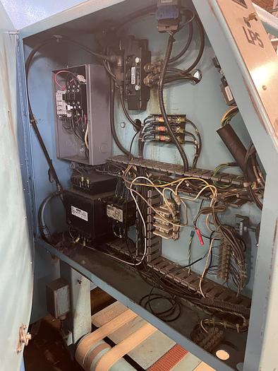 Used 2007 Braun sheet folder with stacker