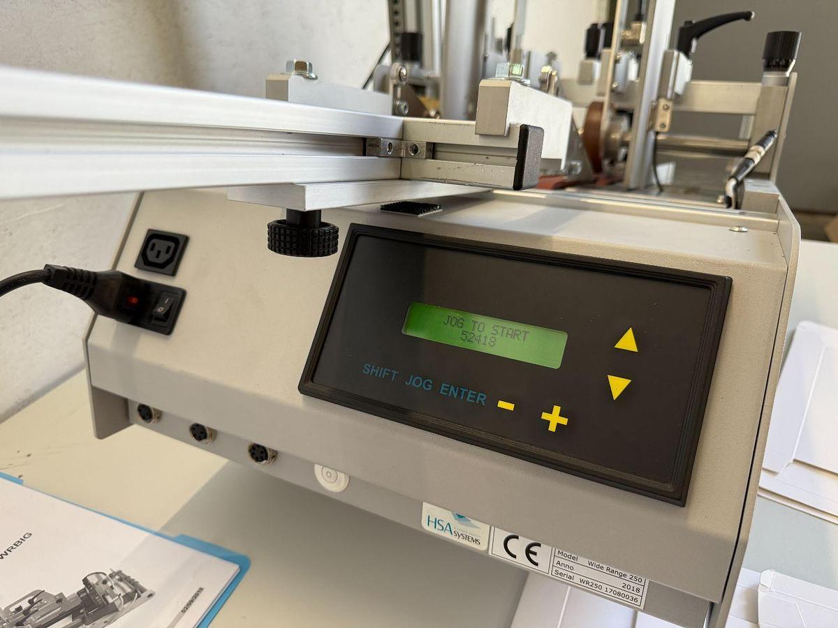 Used Wide Range & HSA Systems Feeder with labeling system