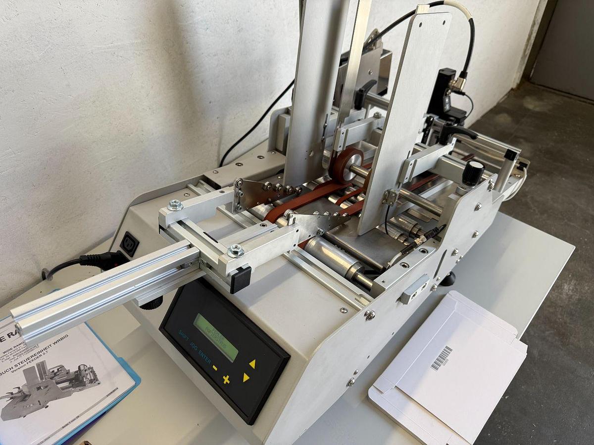 Used Wide Range & HSA Systems Feeder with labeling system