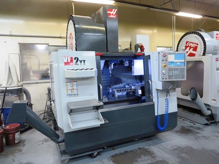 Used HAAS VF2YT 2012 VERTICAL MACHINING CENTER