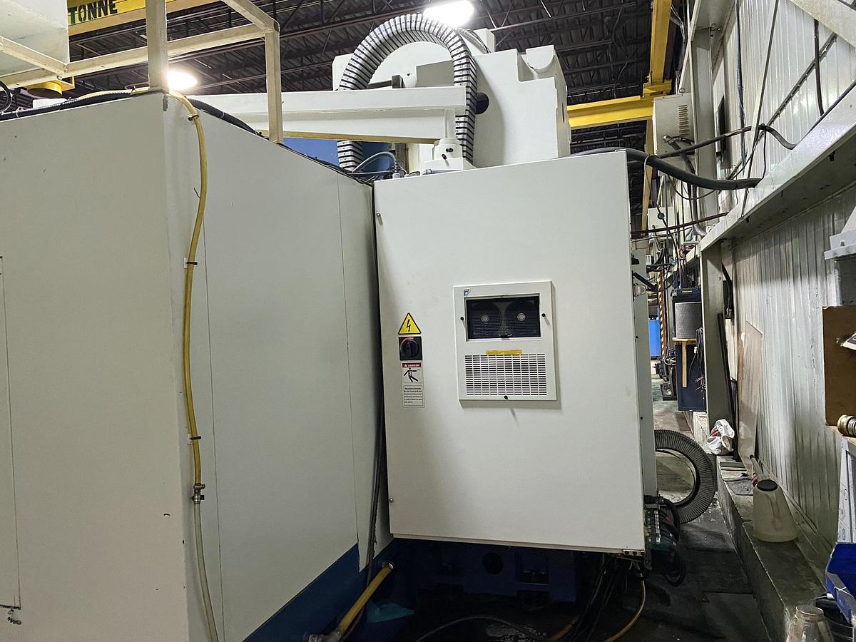 Used TAKUMI V22 VERTICAL MACHINING CENTER