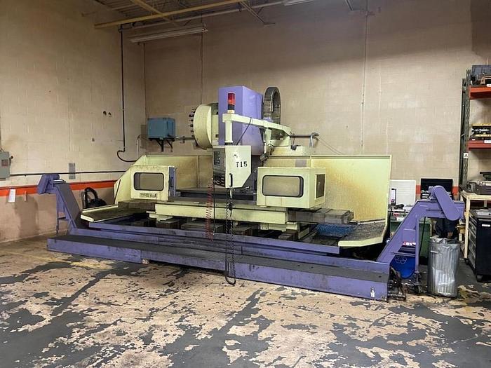 Used TAKUMI V22A VERTICAL MACHINING CENTER