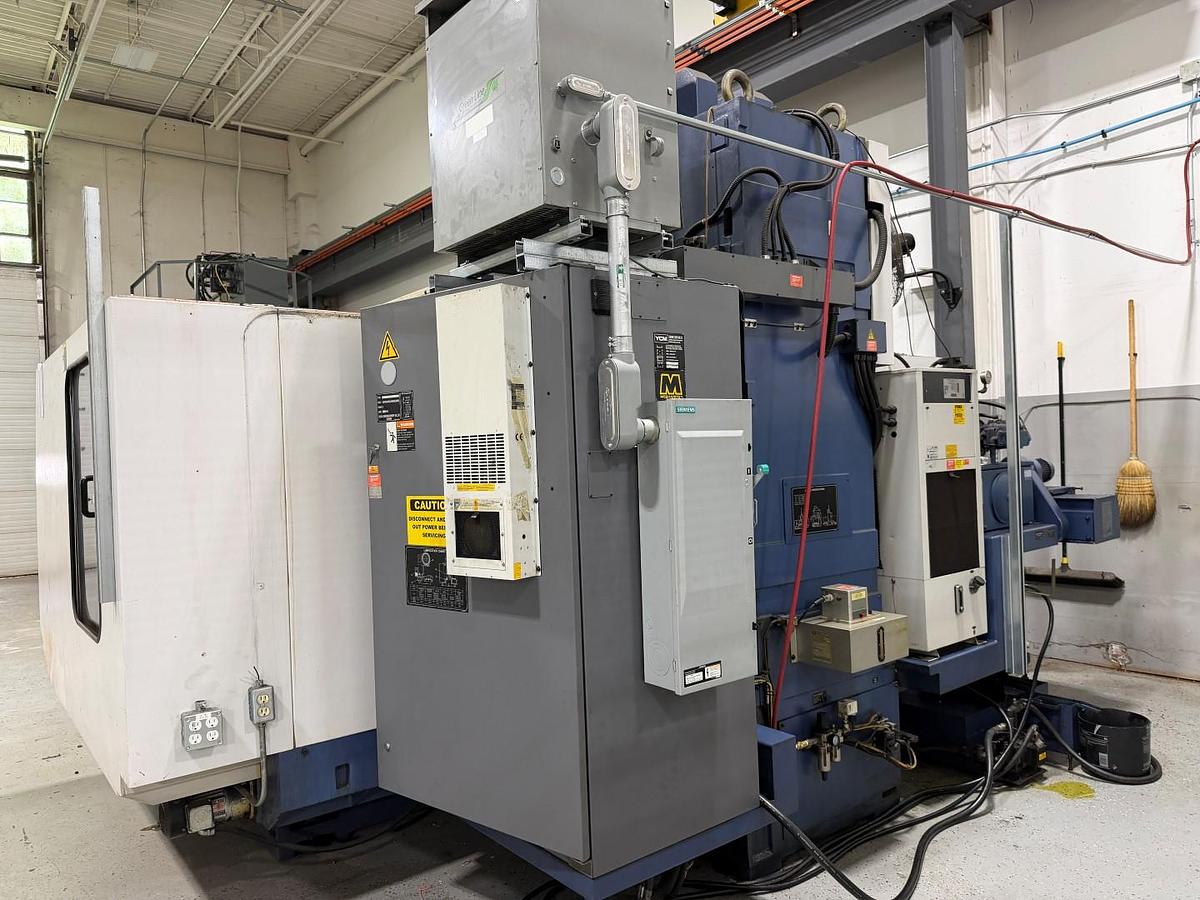 Used YCM TV158B CNC VERTICAL MACHINING CENTER