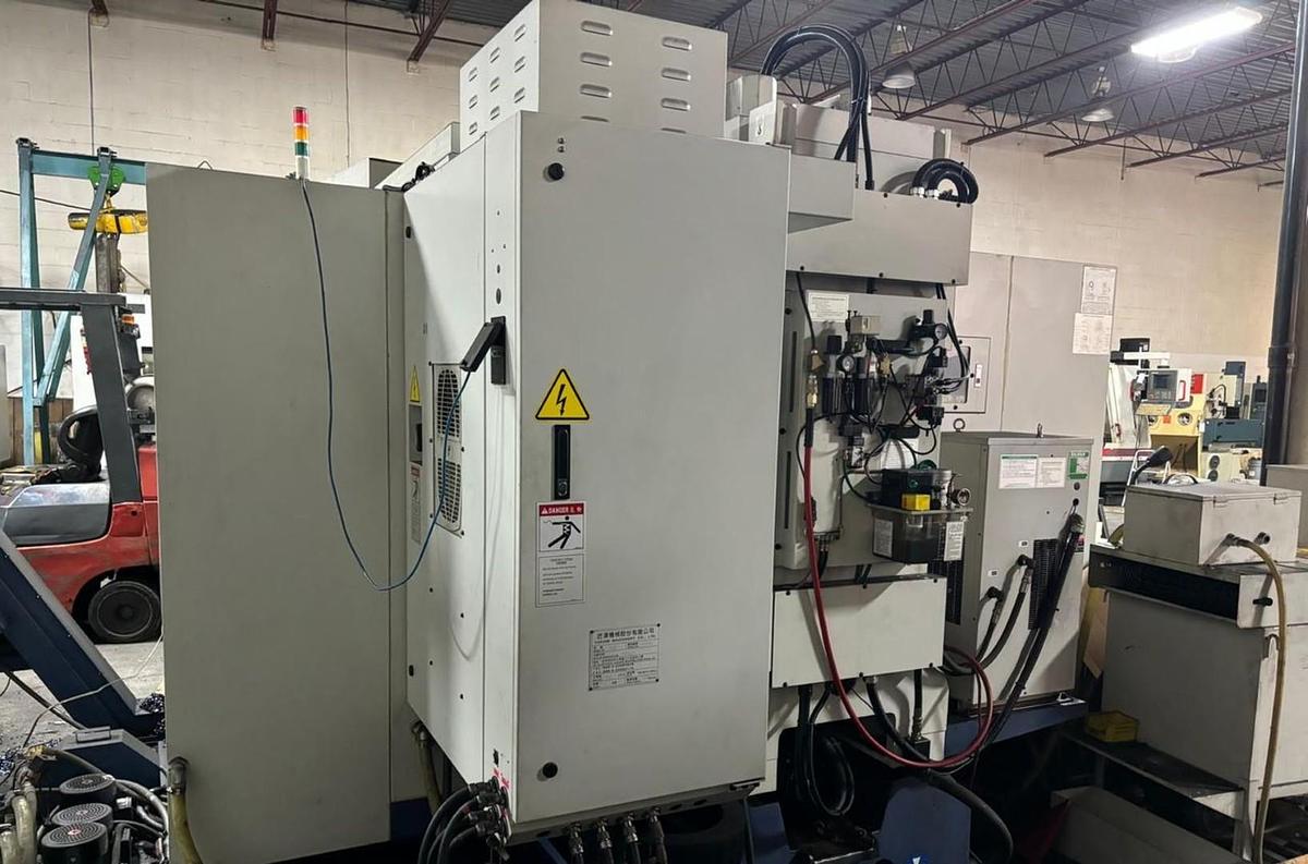 Used TAKUMI V12 CNC VERTICAL MILL