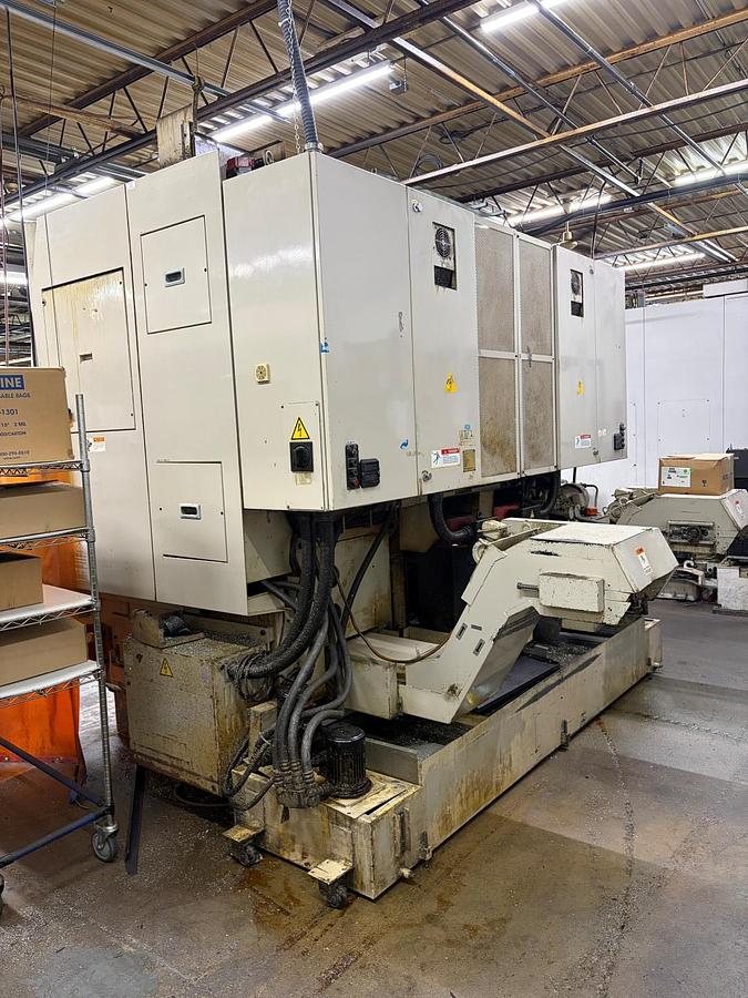 Used OKUMA & HOWA 2SP-V35 CNC TWIN-SPINDLE VERTICAL TURNING CENTER