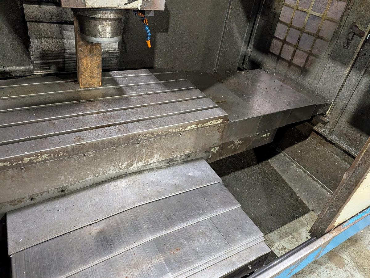 Used TAKUMI V-10AH CNC VERTICAL MACHINING CENTER